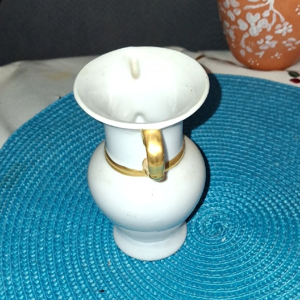 Elegant White Vase with Gold Accents